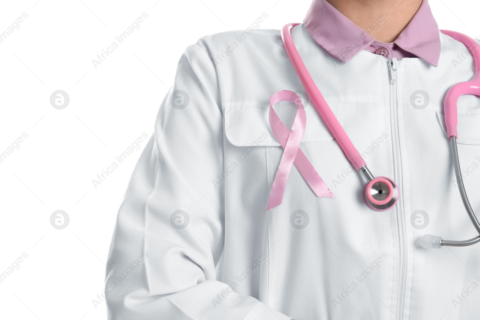 Photo of Doctor with pink ribbon and stethoscope on white background, closeup. Breast cancer awareness