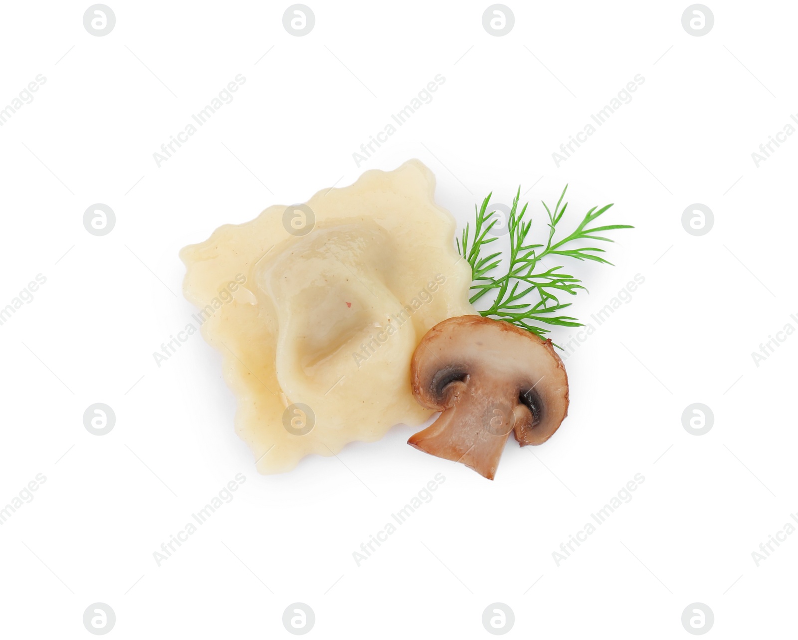 Photo of One delicious ravioli with mushroom and dill isolated on white, top view