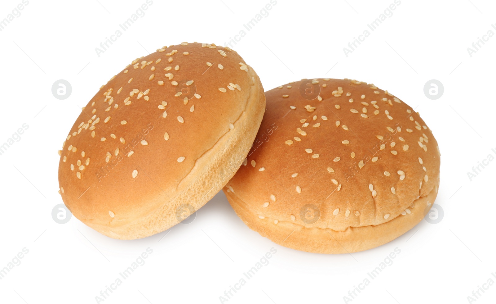 Photo of Two fresh burger buns isolated on white