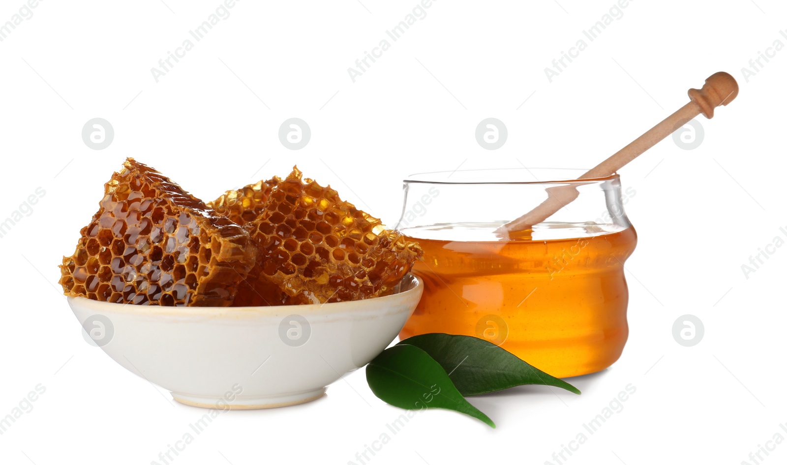 Photo of Composition with jar of honey isolated on white