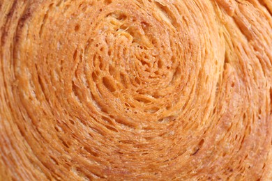Photo of Tasty puff pastry. Supreme croissant as background, closeup