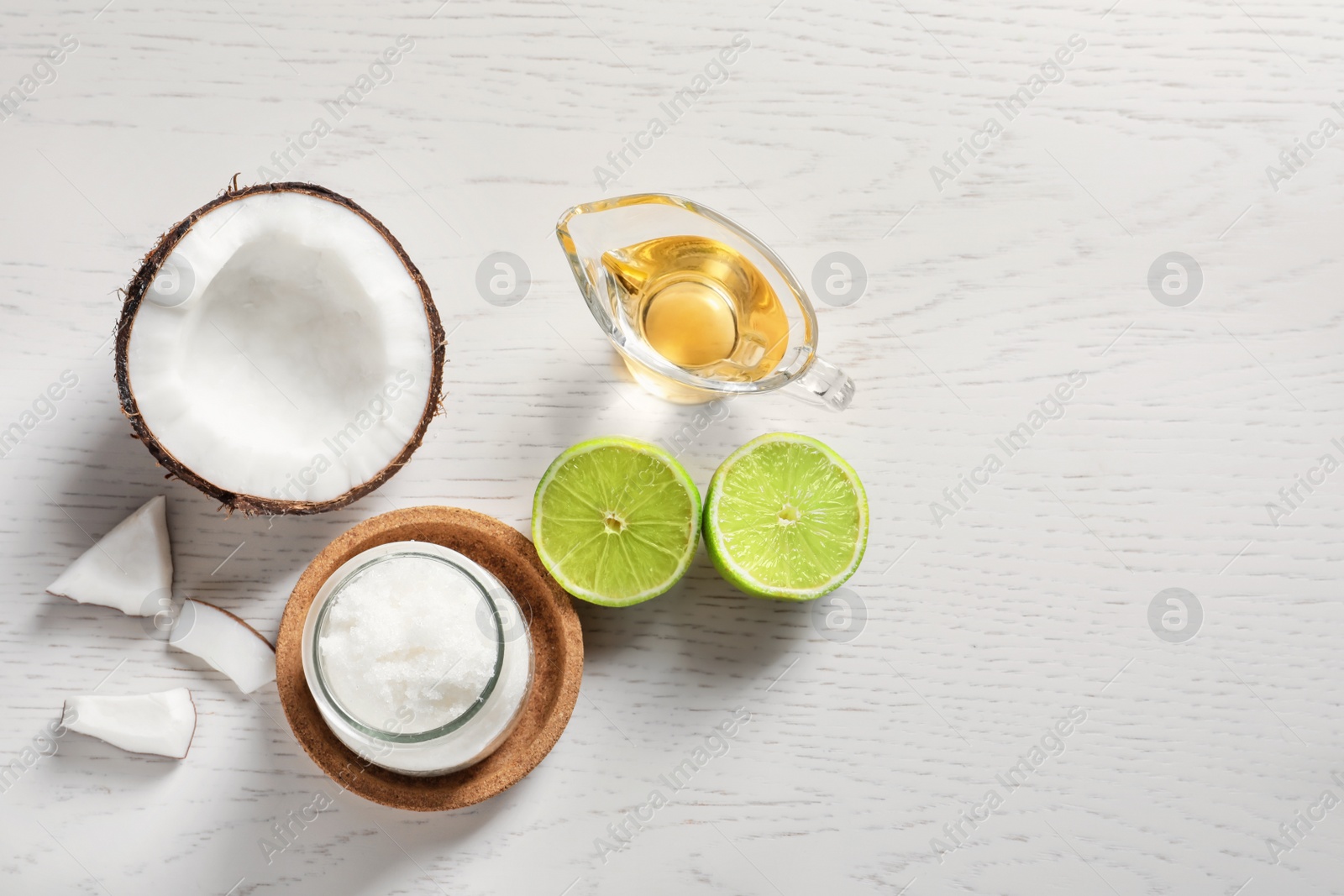 Photo of Composition with natural coconut scrub on table