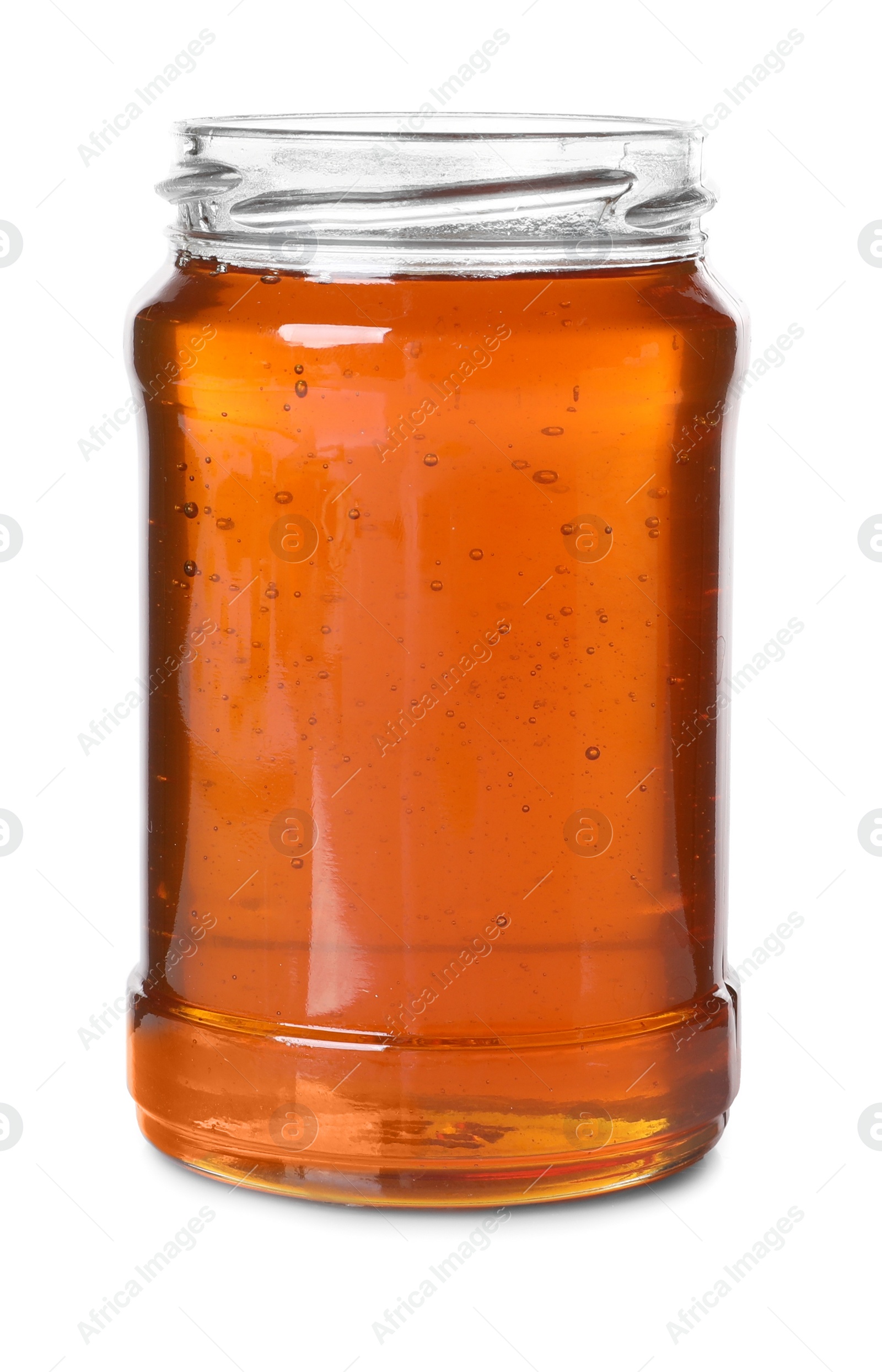 Photo of Tasty natural honey in glass jar isolated on white