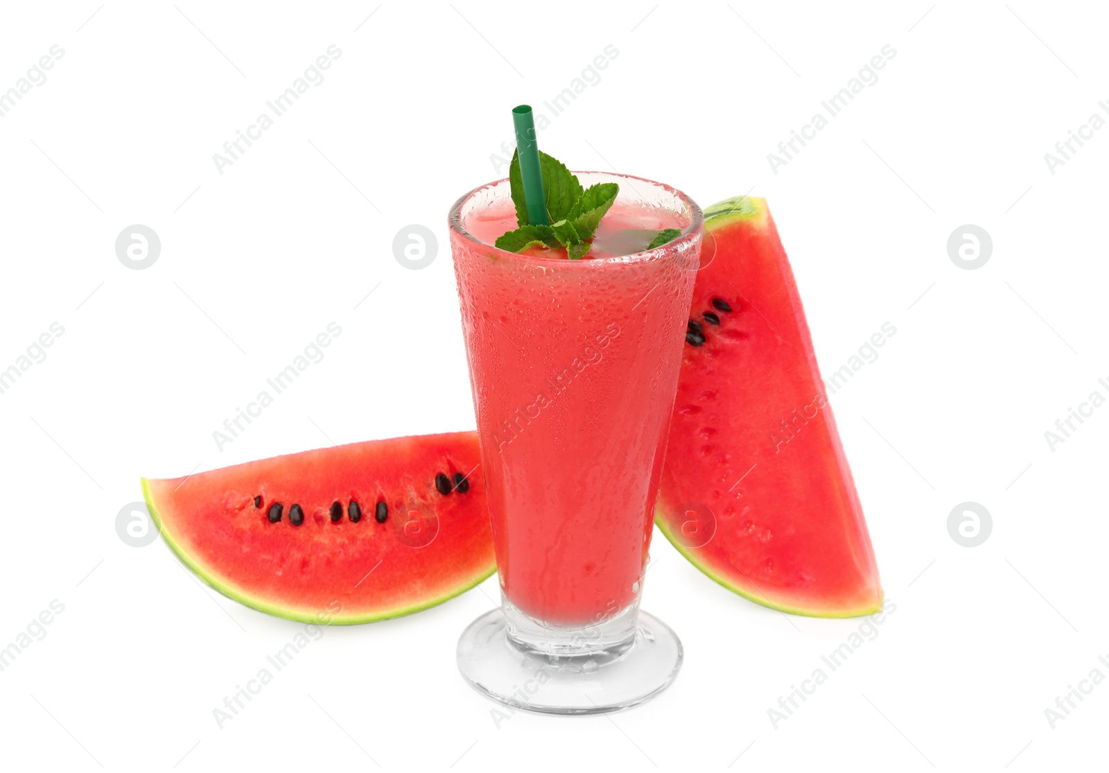 Photo of Glass of tasty watermelon drink with mint and cut fresh fruit isolated on white