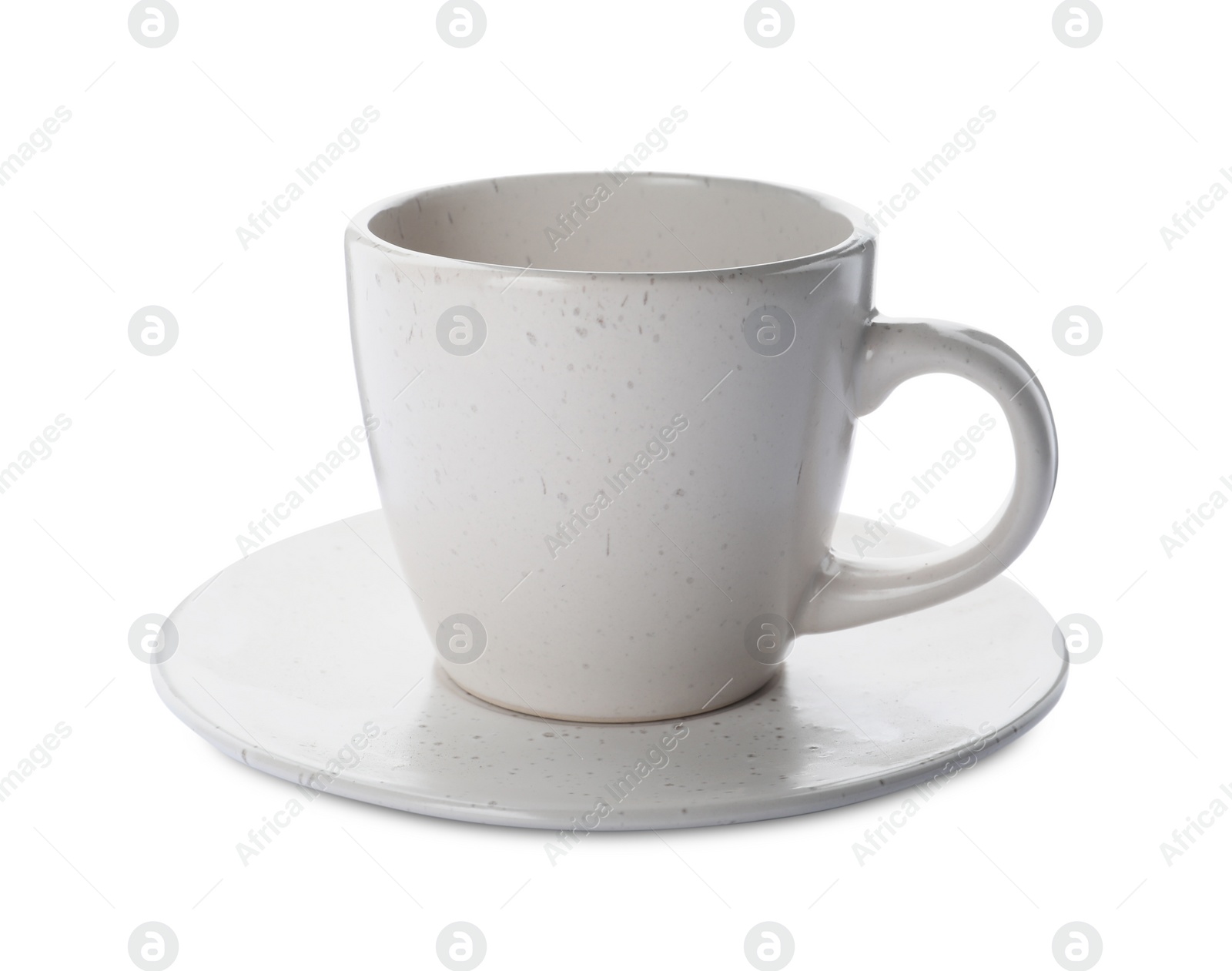 Photo of New clean ceramic cup and saucer on white background