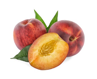 Photo of Sweet juicy peaches with leaves on white background