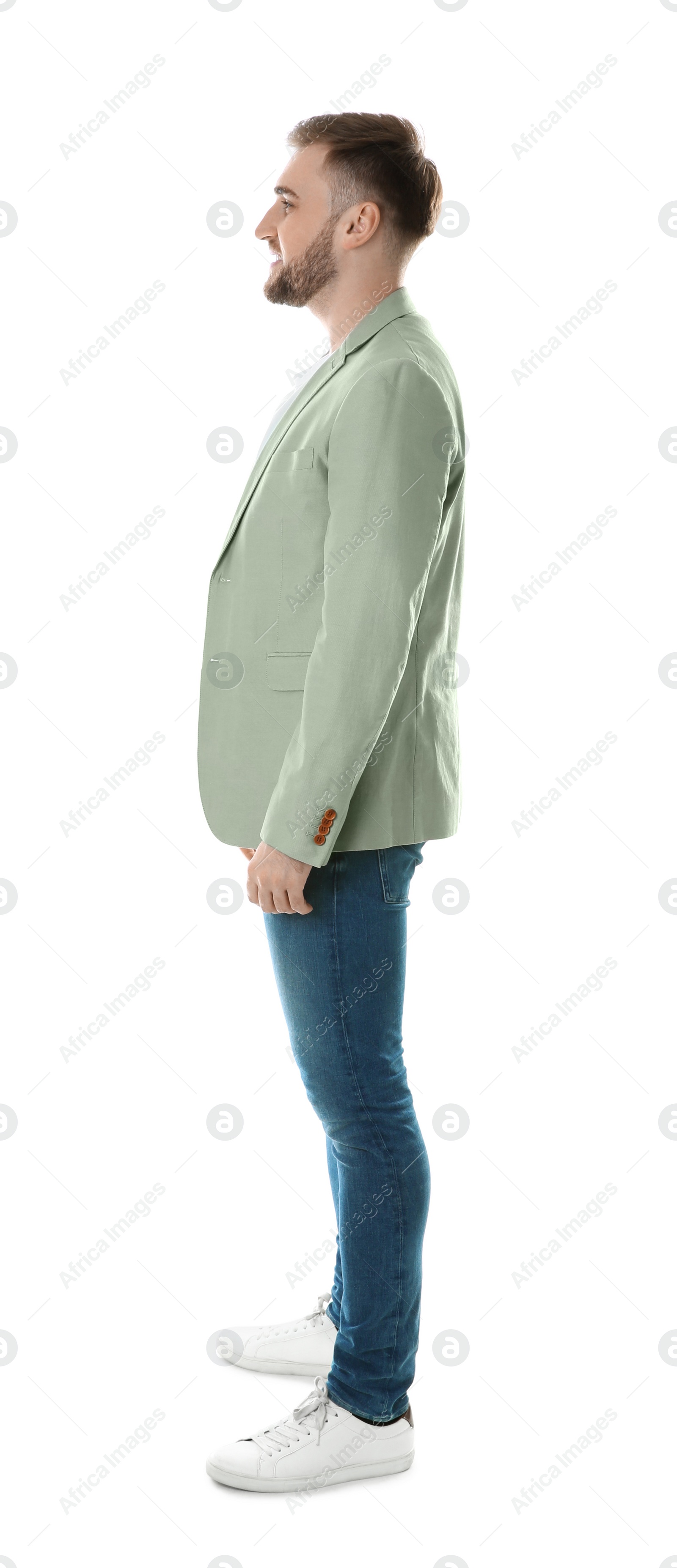 Photo of Full length portrait of young man on white background