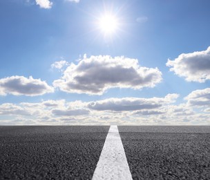 Image of View of empty asphalt road on sunny day