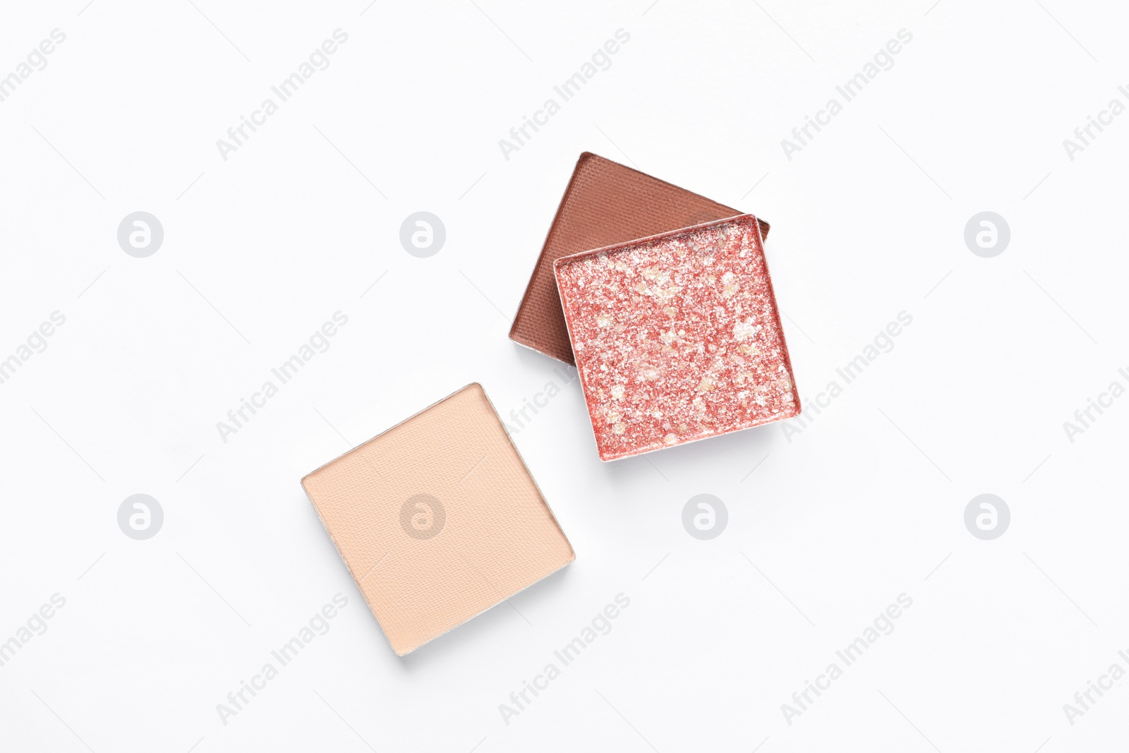 Photo of Different beautiful eye shadows on white background, flat lay