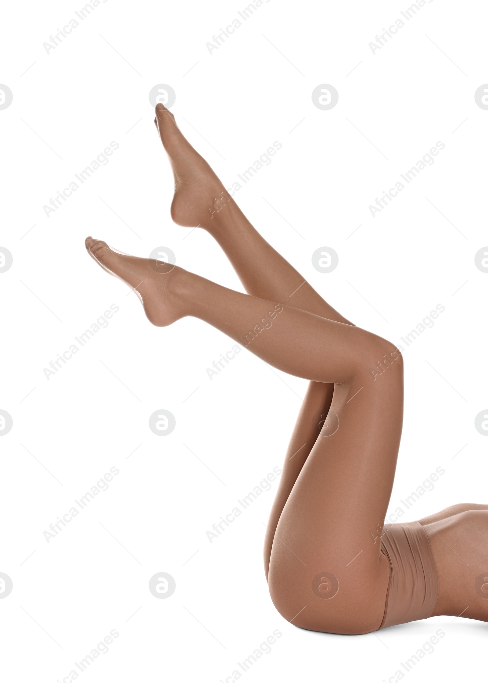 Photo of Woman with beautiful long legs wearing tights on white background, closeup