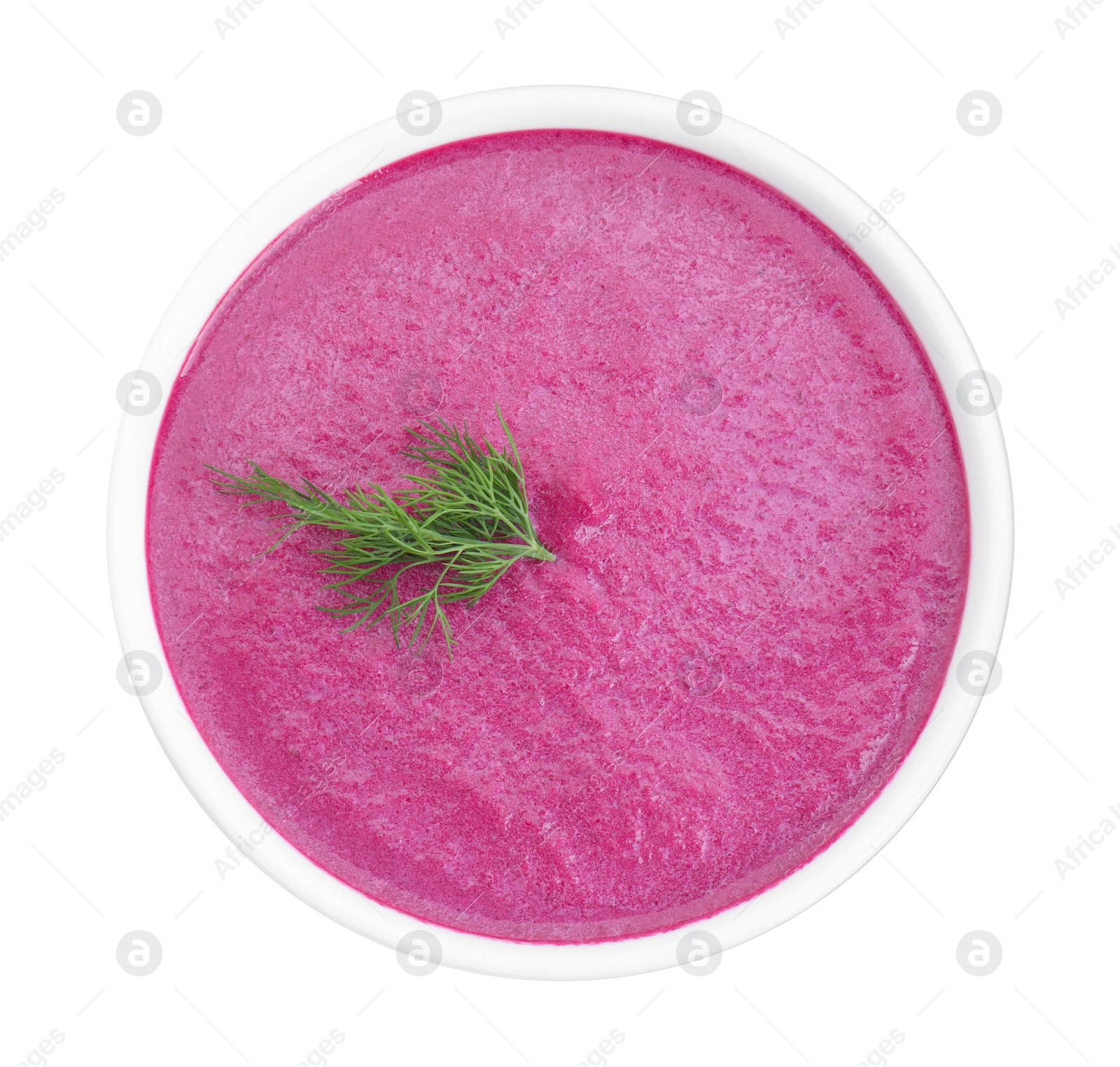 Photo of Delicious beetroot cream soup in bowl isolated on white, top view