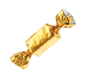 Tasty candy in golden wrapper isolated on white