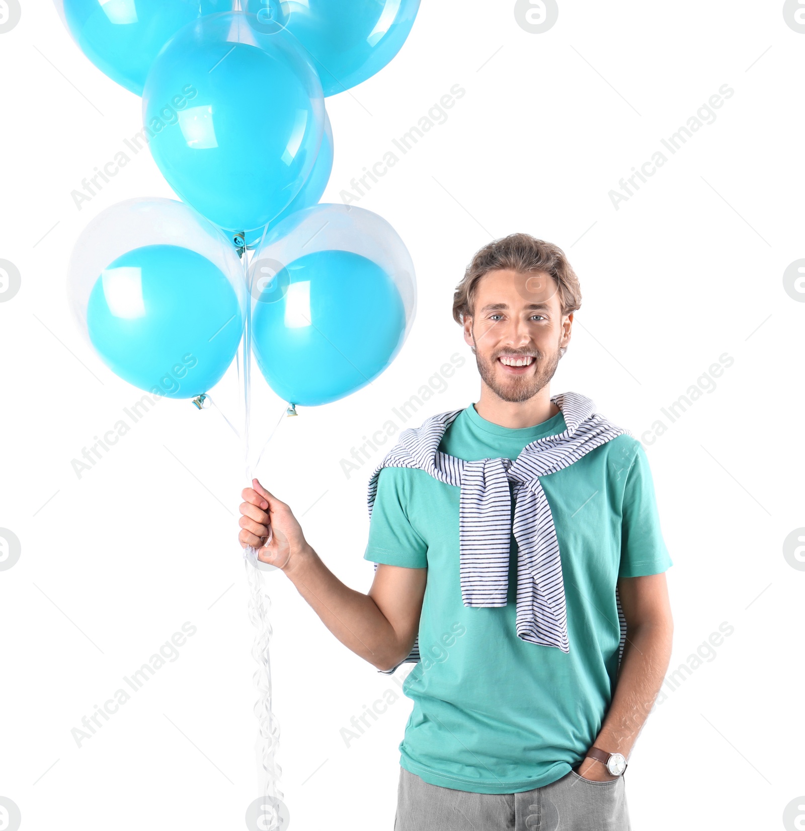 Photo of Young man with air balloons on white background