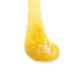 Photo of Flowing yellow slime isolated on white. Antistress toy