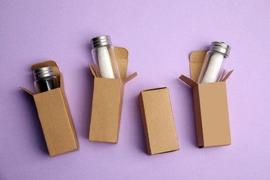 Photo of Flat lay composition with natural dental floss on violet background