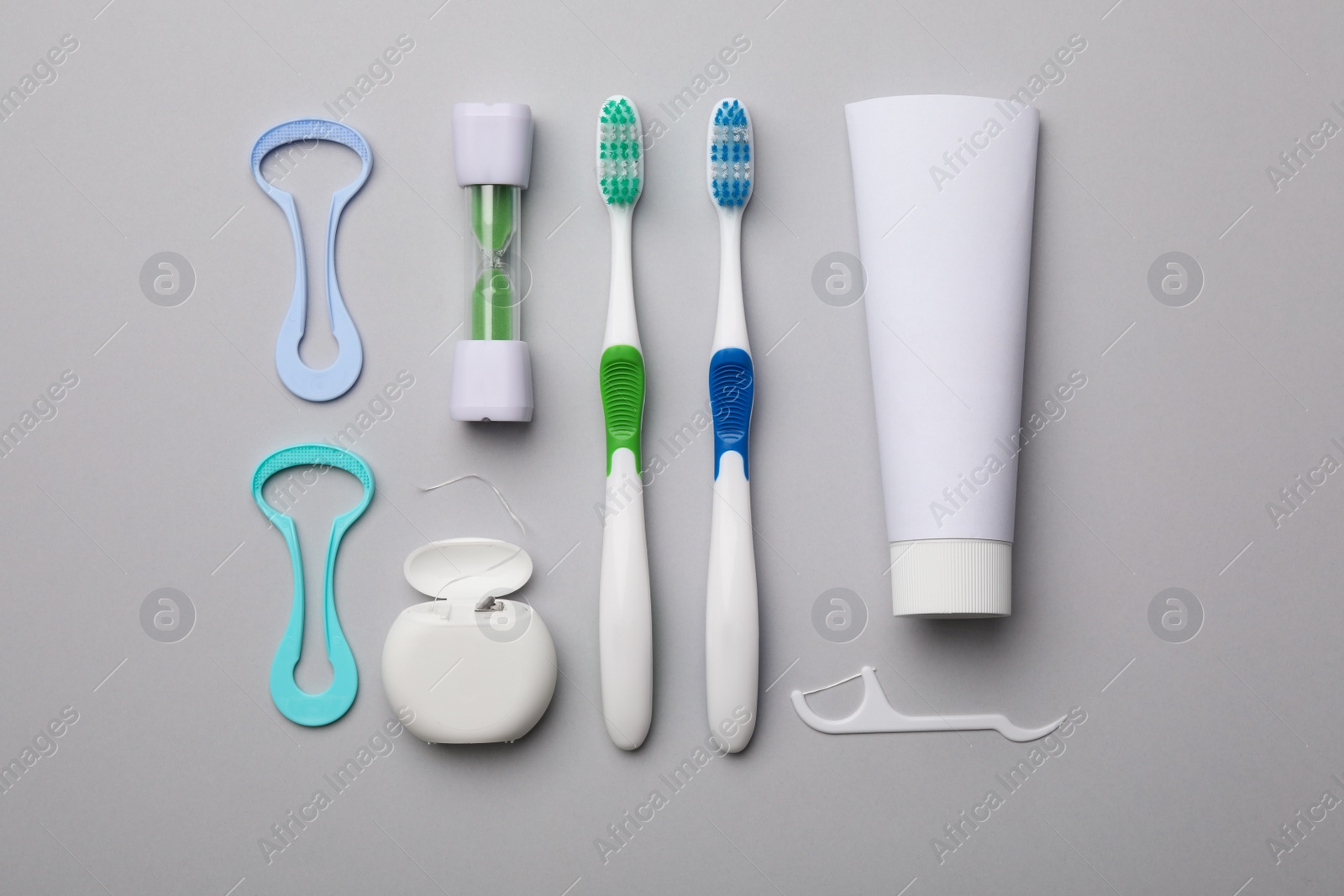 Photo of Flat lay composition with tongue cleaner on color background