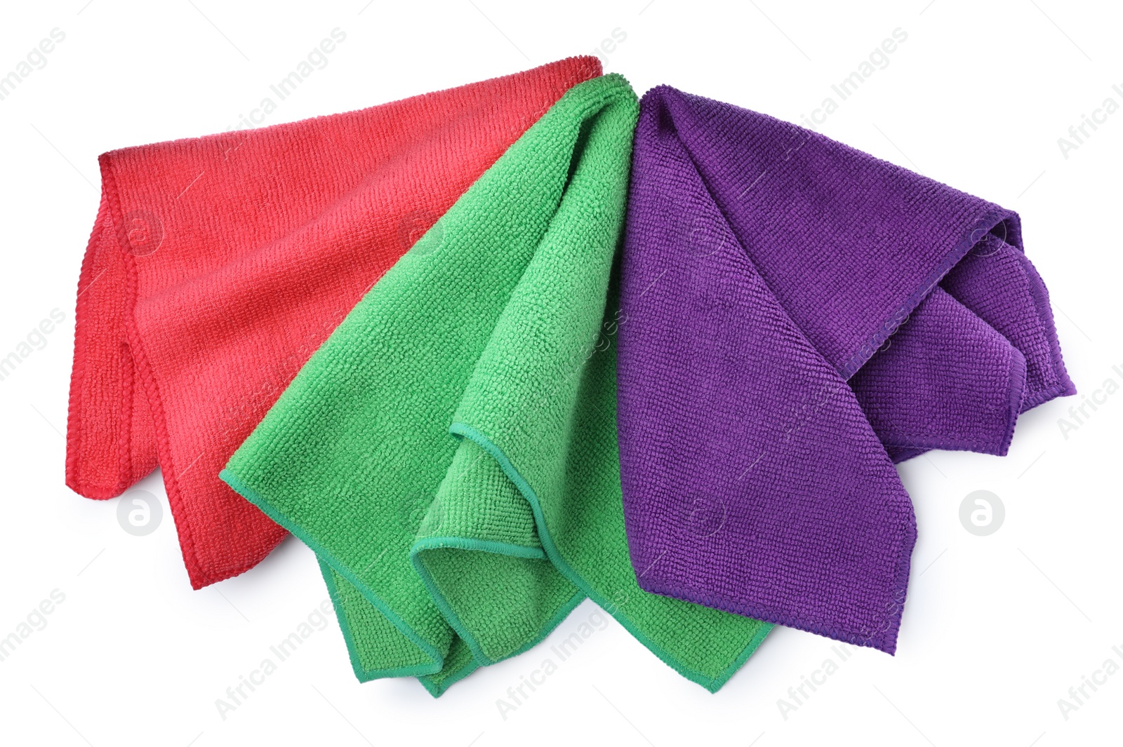 Photo of Colorful microfiber cloths on white background, top view