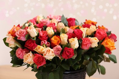 Photo of Bouquet of beautiful roses on light background