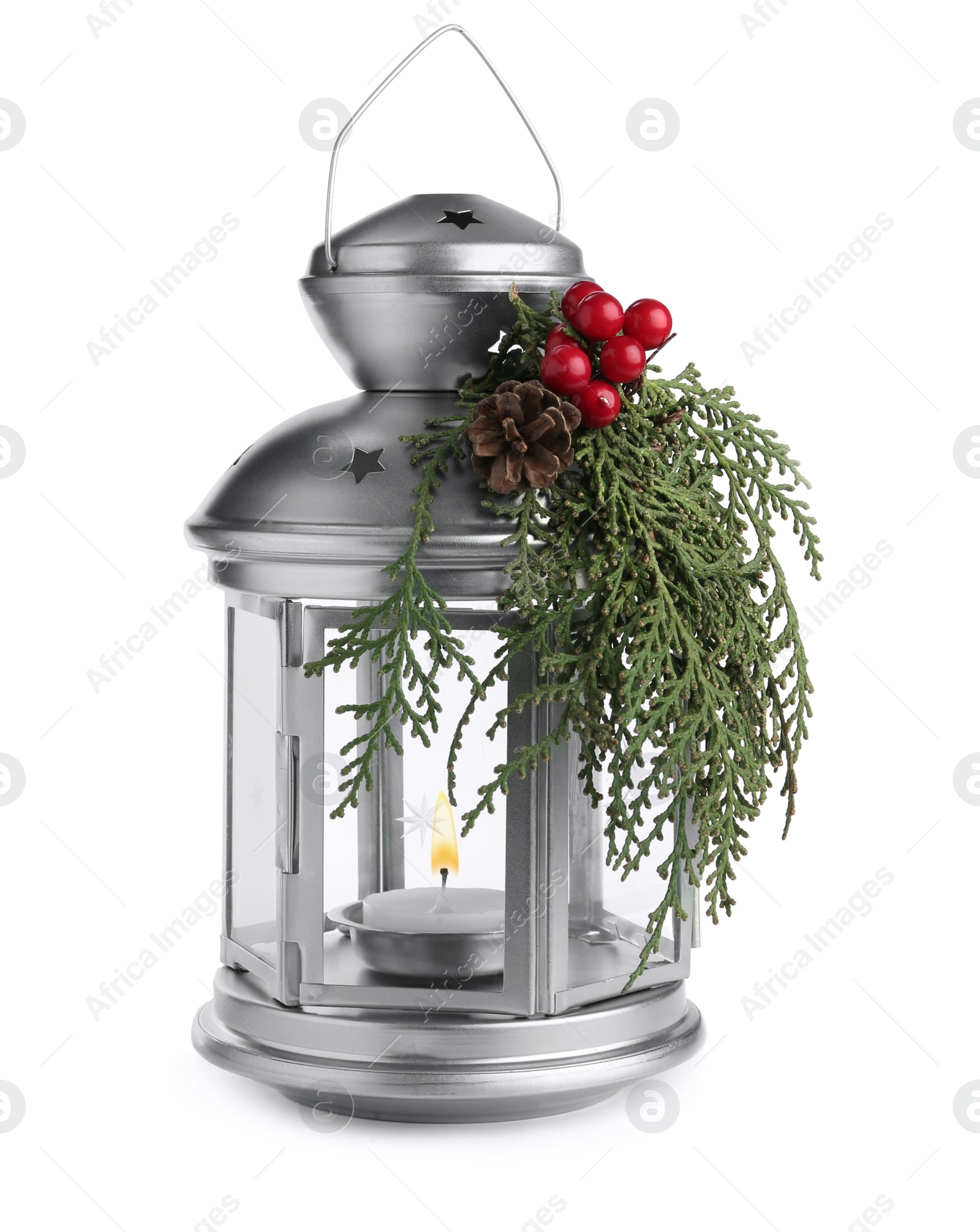 Photo of Lantern with Christmas decorations isolated on white