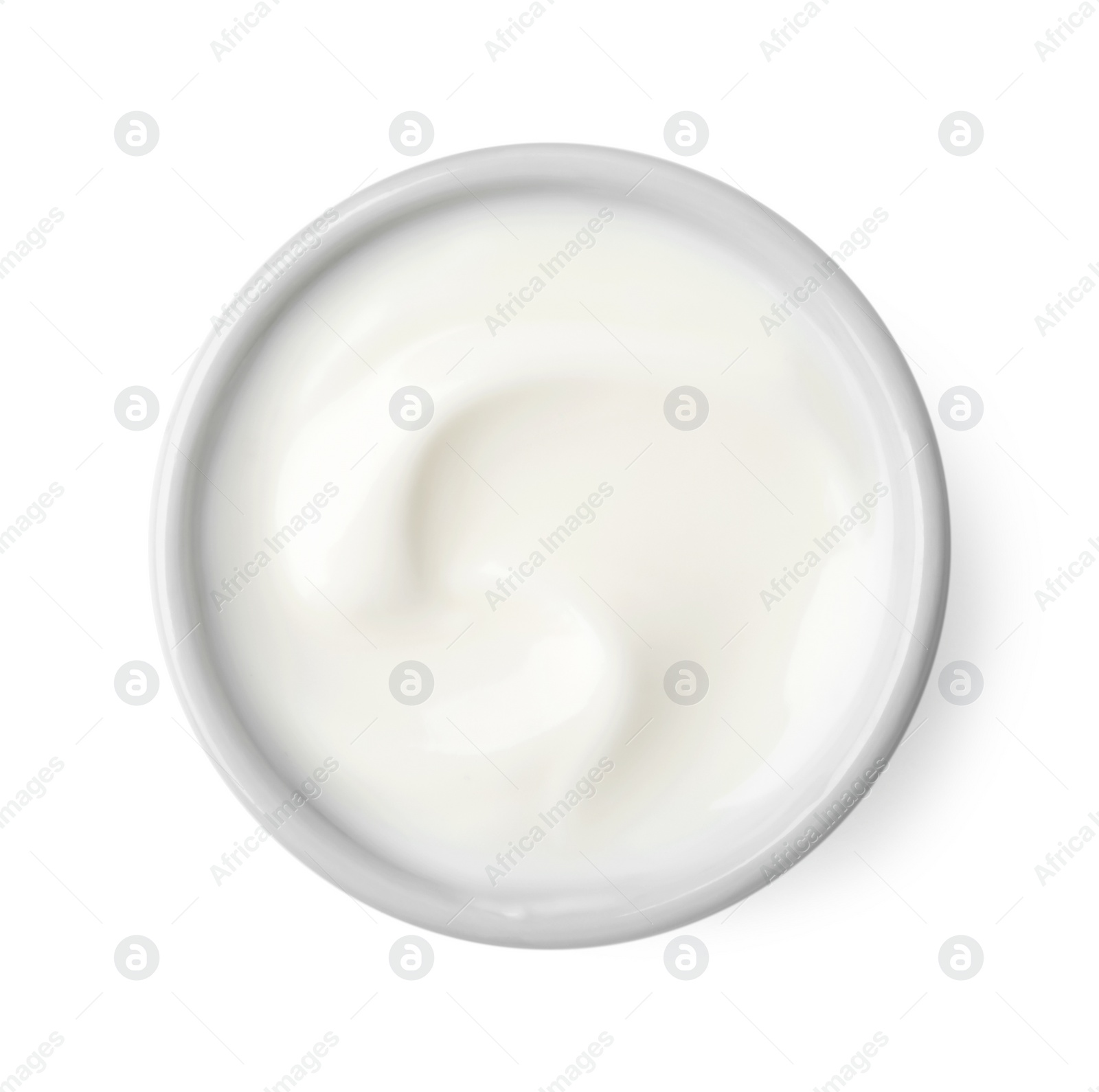 Photo of Delicious natural yogurt in bowl isolated on white, top view