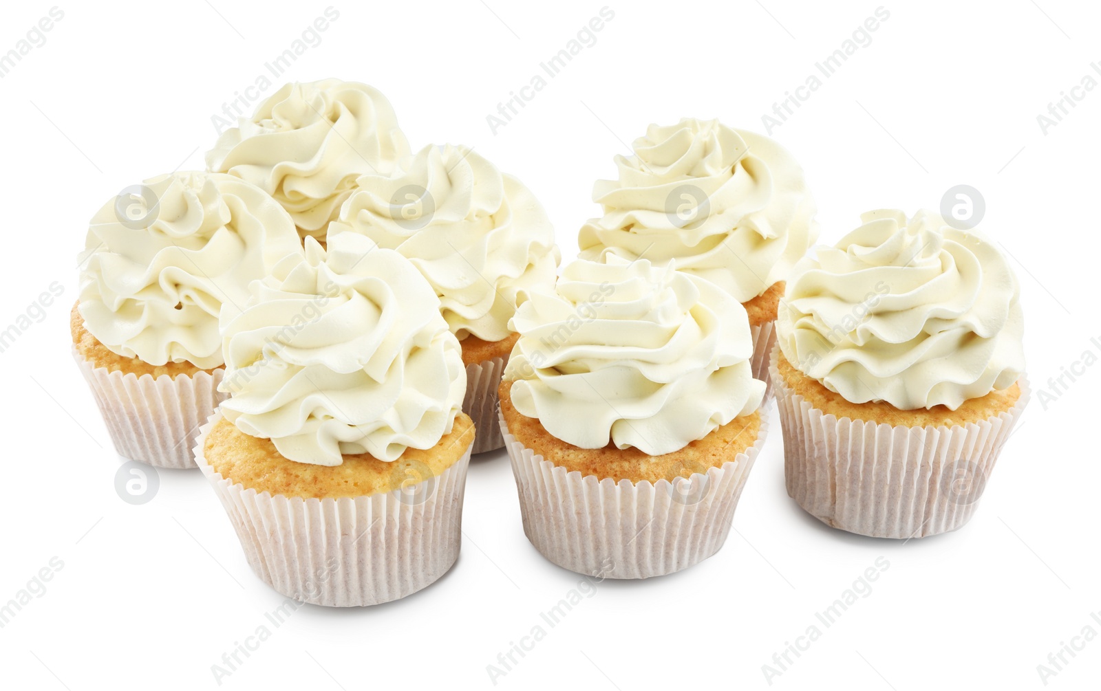 Photo of Tasty vanilla cupcakes with cream isolated on white