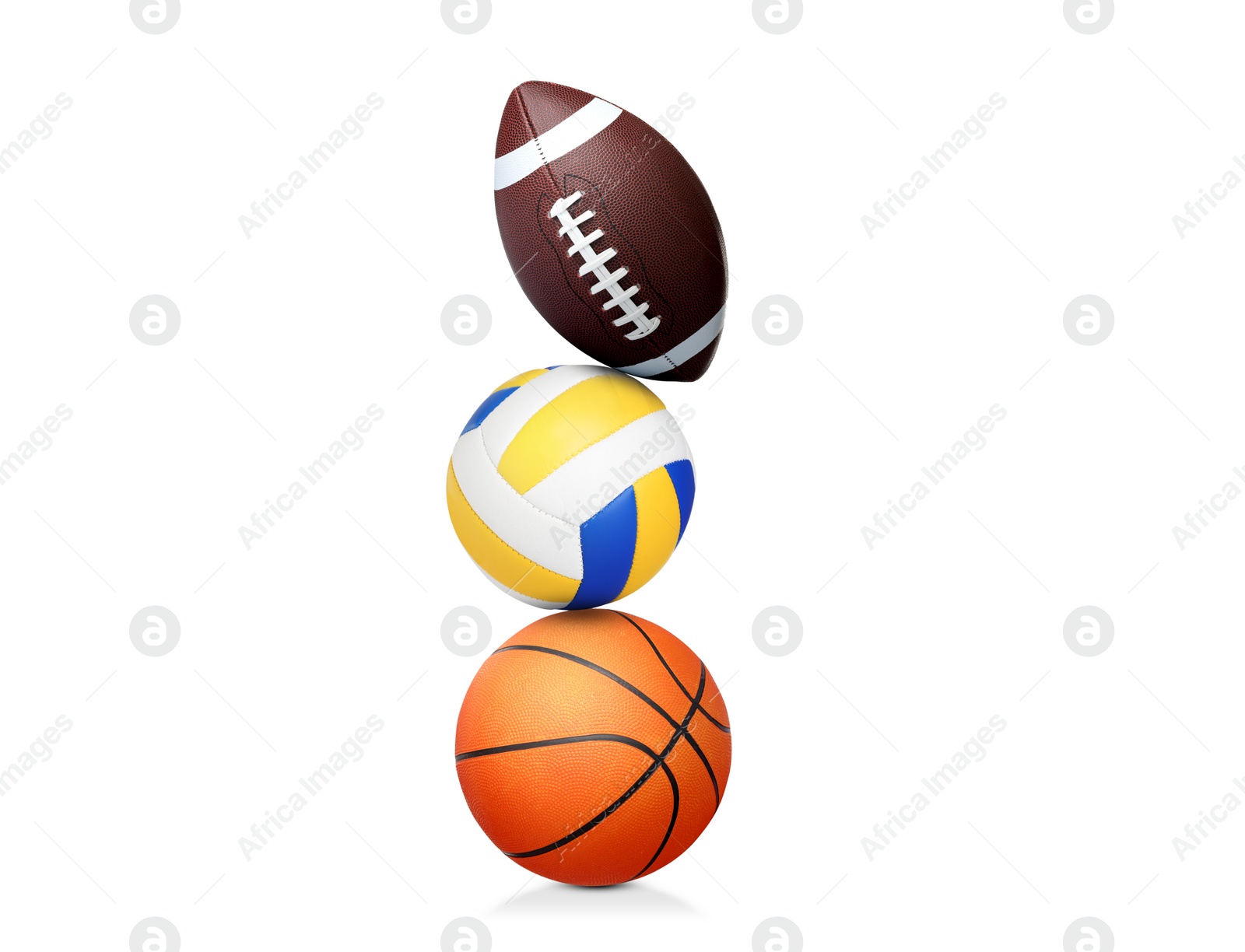 Image of Stack of different sport balls on white background