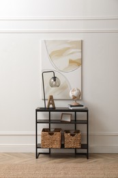 Light hallway interior with stylish console table