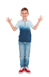 Full length portrait of cute little boy in casual outfit on white background