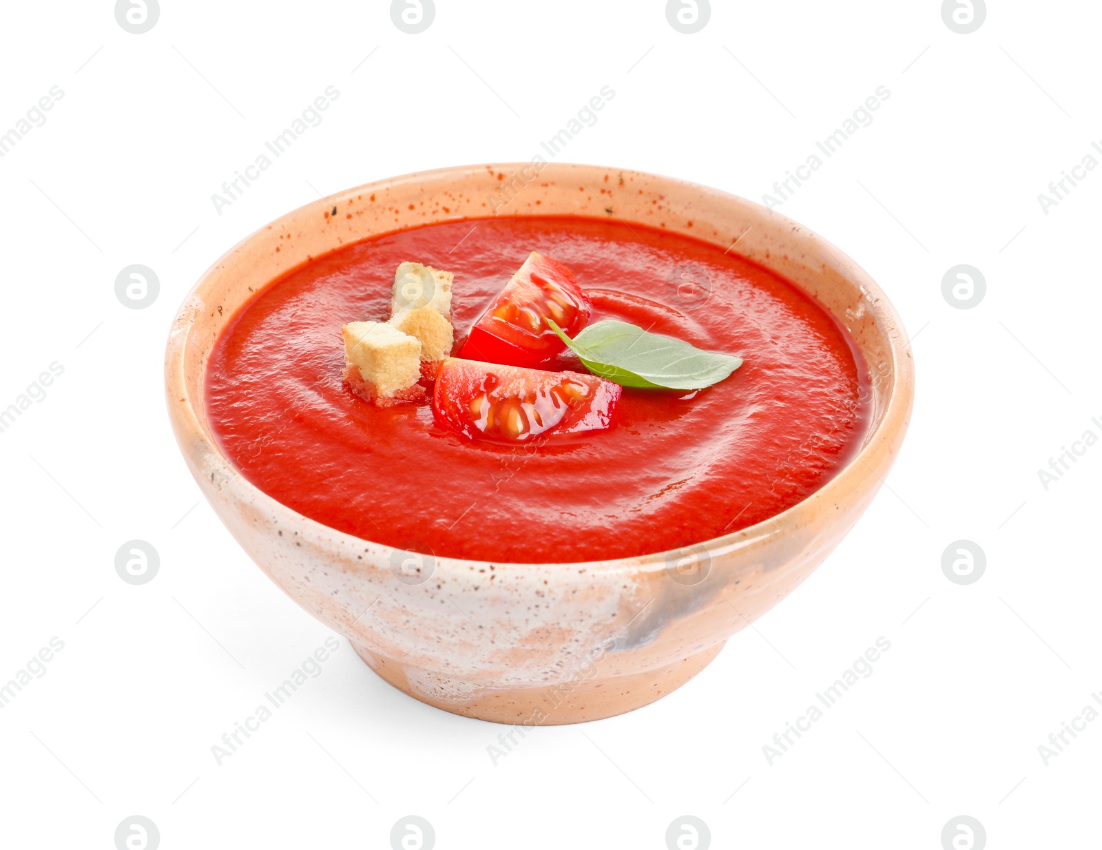 Photo of Bowl with fresh homemade tomato soup on white background