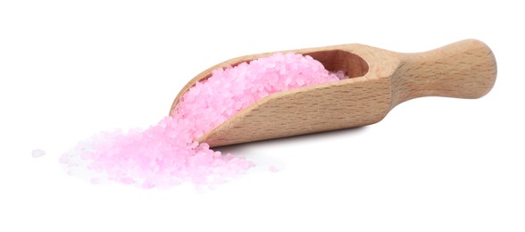 Wooden scoop with pink sea salt on white background