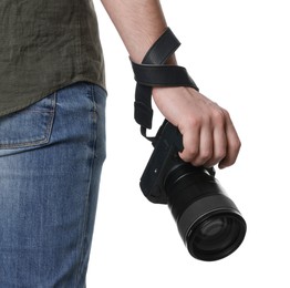 Photographer holding modern camera on white background, closeup