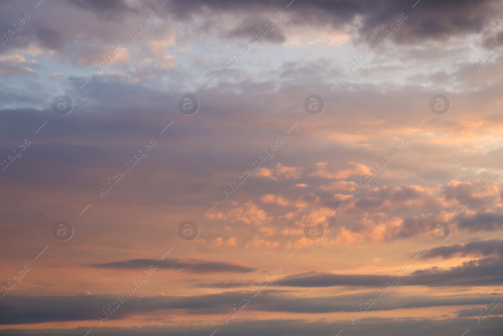 Photo of Picturesque view of sunset sky with beautiful clouds