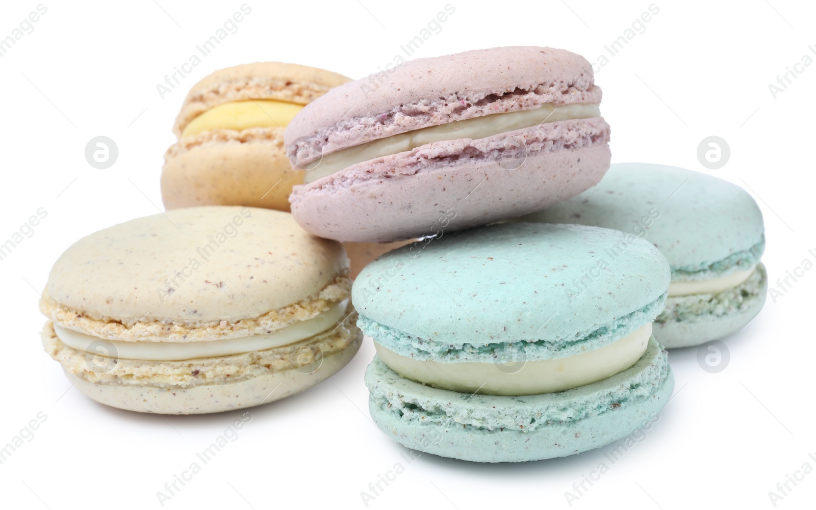 Photo of Different delicious colorful macarons on white background