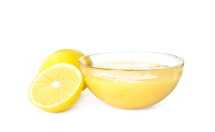 Delicious lemon curd and fresh fruits on white background