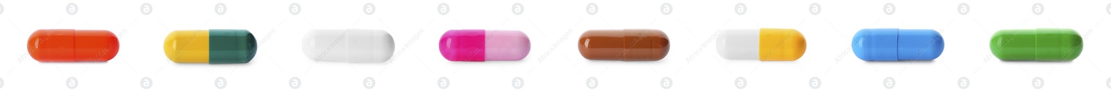 Image of Set with colorful pills on white background, top view. Banner design