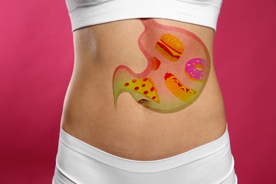 Woman with image of stomach full of junk food drawn on her belly against pink background, closeup. Unhealthy eating habits