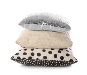 Stack of different colorful pillows on white background