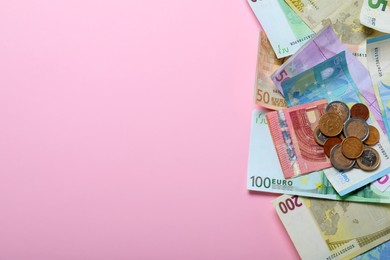 Money on pink background, flat lay. Space for text 