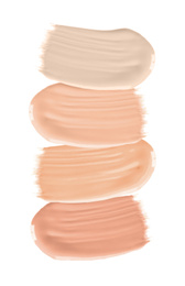 Image of Set of different foundation shades on white background, top view