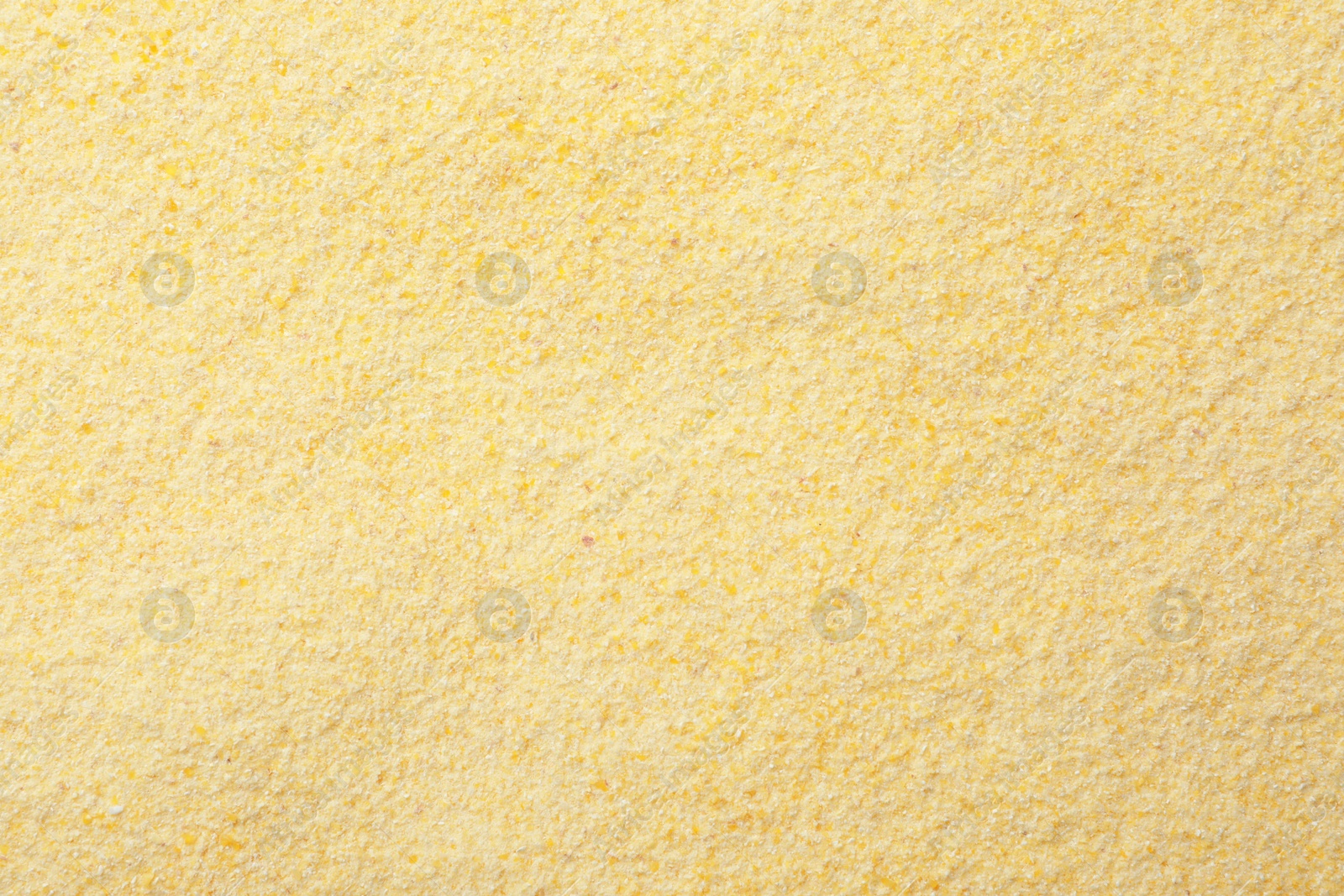 Photo of Corn flour as background, top view. Gluten free product
