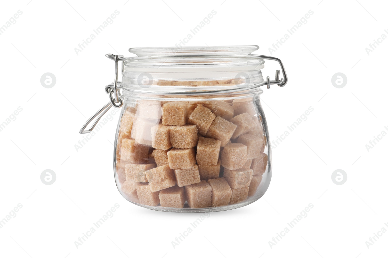 Photo of Glass jar of brown sugar cubes isolated on white