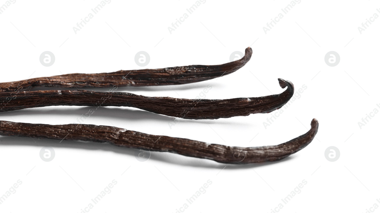 Photo of Aromatic vanilla sticks on white background