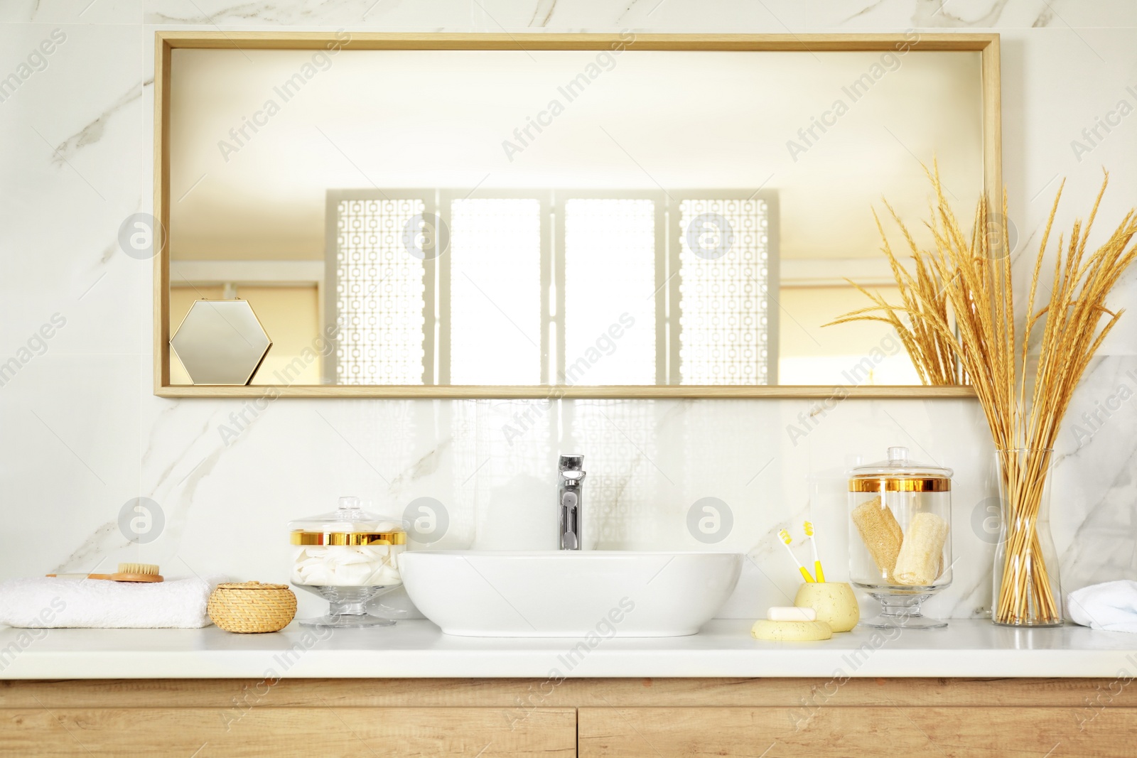 Photo of Modern bathroom interior with big stylish mirror