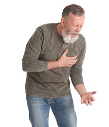 Mature man having heart attack on white background