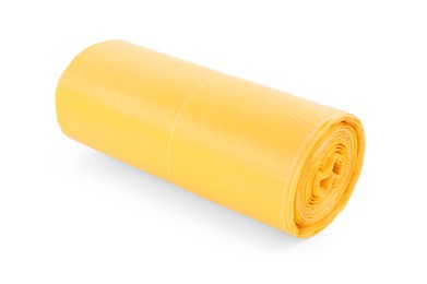 Photo of Roll of yellow garbage bags isolated on white