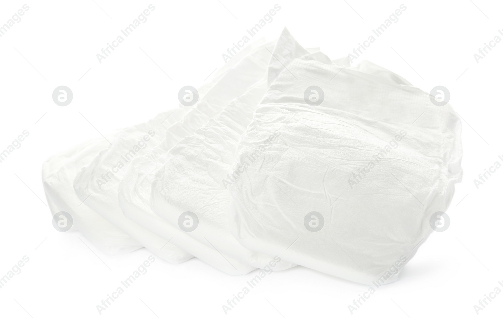 Photo of Pile of baby diapers isolated on white