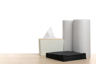 Photo of Different clean paper tissues on wooden table