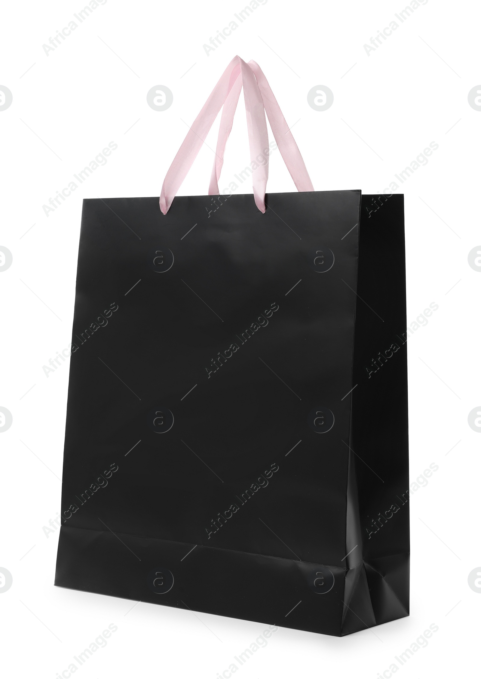 Photo of Paper shopping bag with handles on white background. Mockup for design