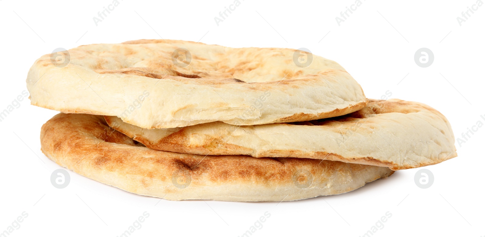 Photo of Loaves of delicious fresh pita bread on white background