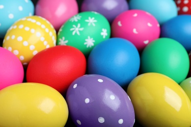 Colorful eggs as background, closeup. Happy Easter